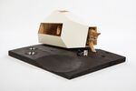 A lunar ship-inspired shelter by Knowhow Shop for the feline space enthusiast.