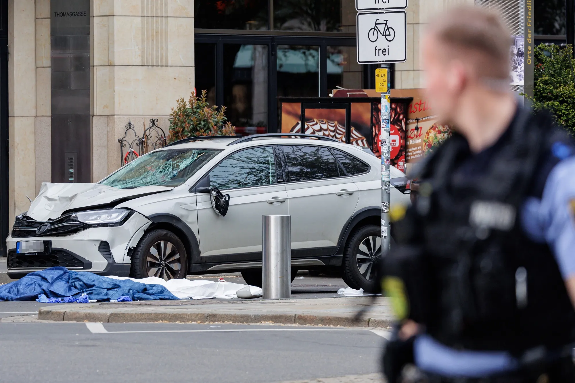 Members of the emergency services work at the scene of the attack in the city centre in Leipzig, eastern Germany on May 4.