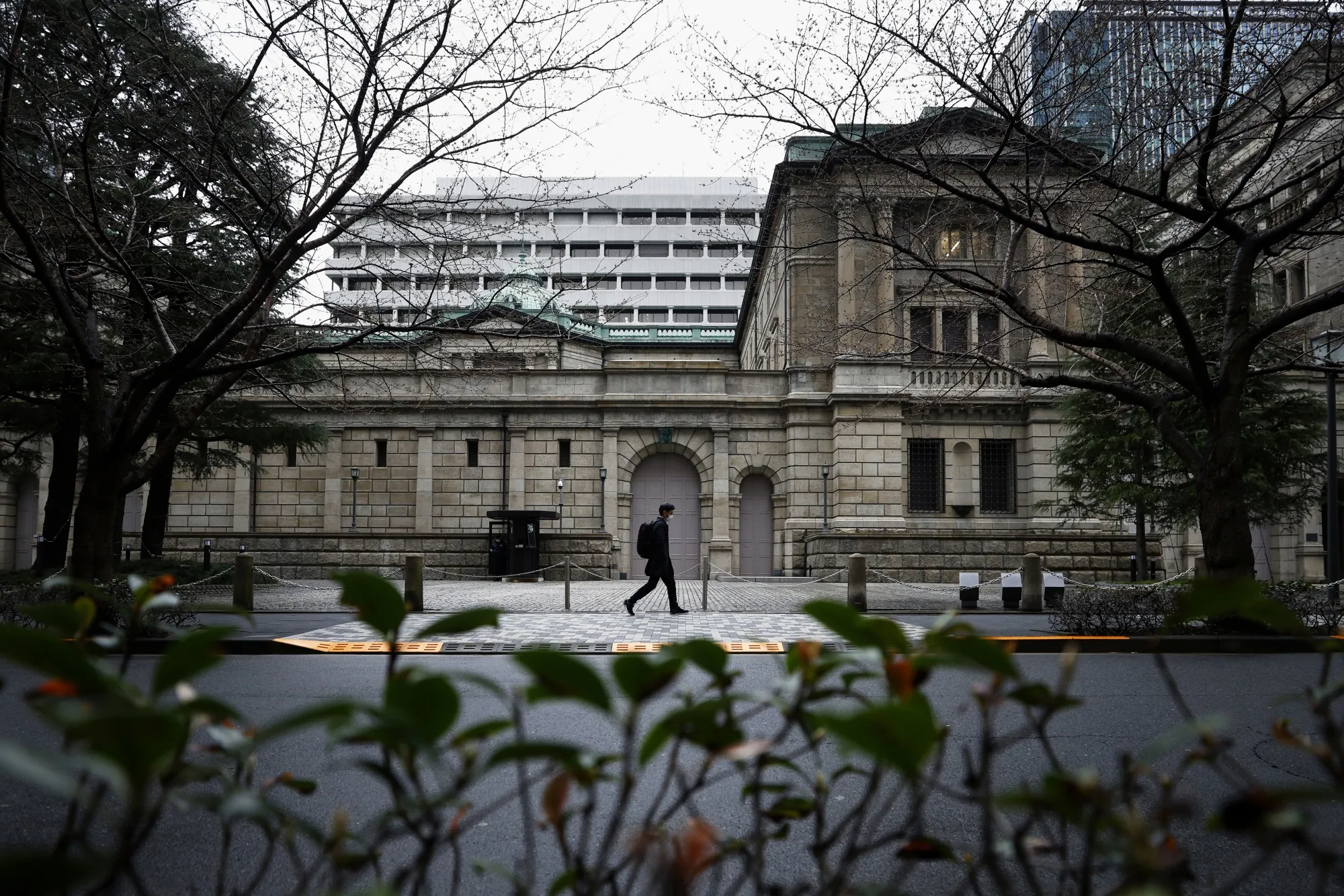 A pedestrian in front of the Bank of Japan&nbsp;in Tokyo.