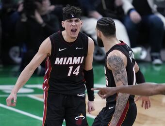relates to Herro scores 24, Heat hit franchise playoff-record 23 3s to beat Boston and even series 1-1