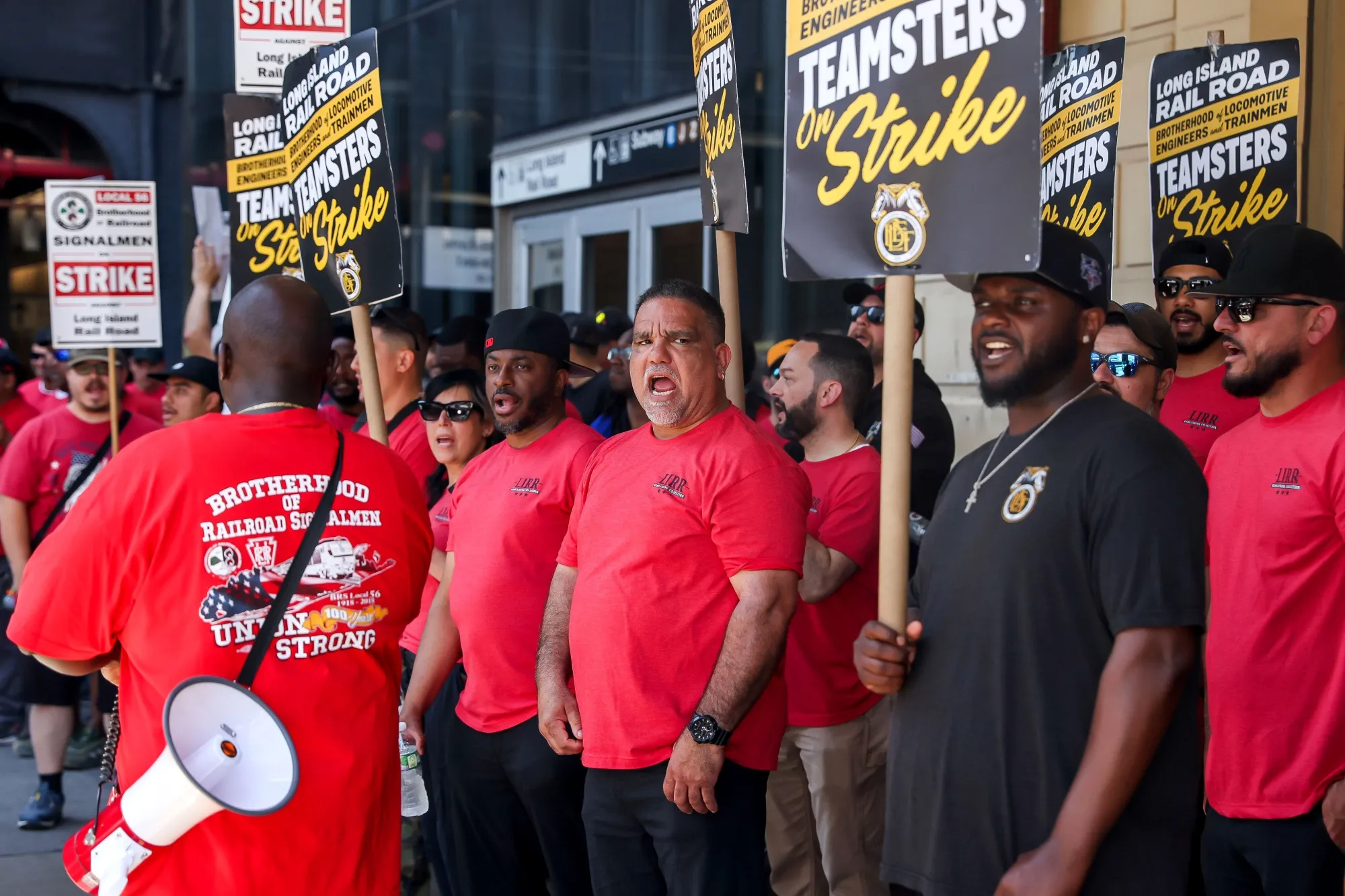 Long Island Rail Road workers picket at Jamaica Station in New York on May 18.
