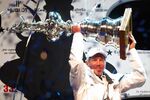Larry Ellison lifts the America's Cup in 2010