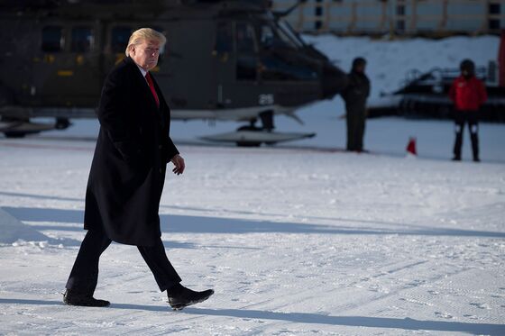 Trump Woos Davos as Impeachment Trial Starts
