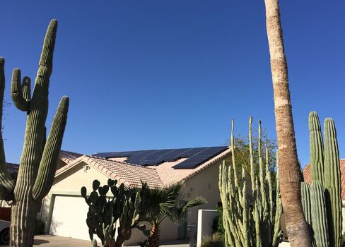 Roof solar panels on a residence in Mesa, Ariz.