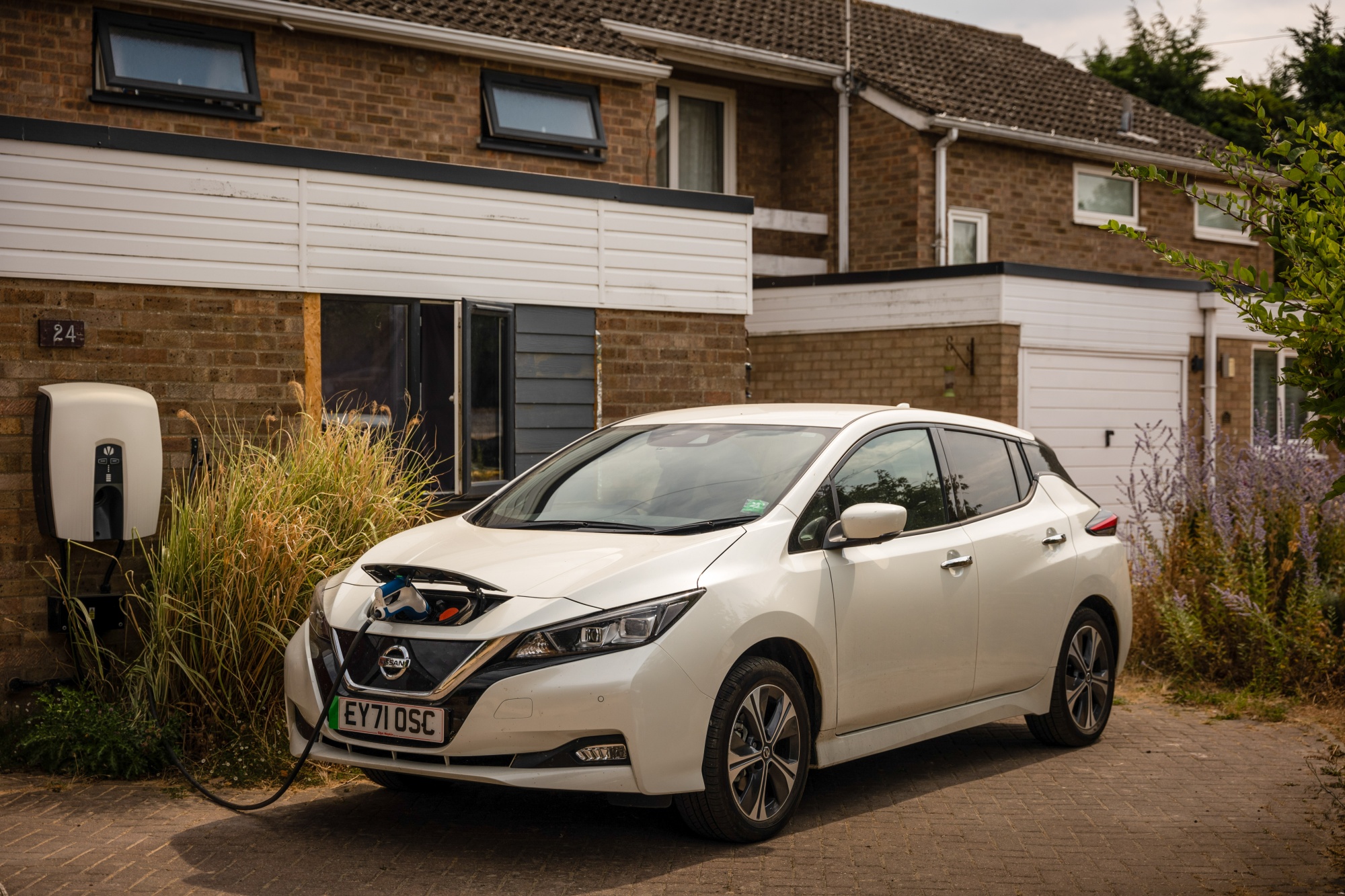 Paul Kershaw’s Nissan Leaf electric vehicle charging outside his home near&nbsp;Cambridge, UK, on&nbsp;Aug. 15.