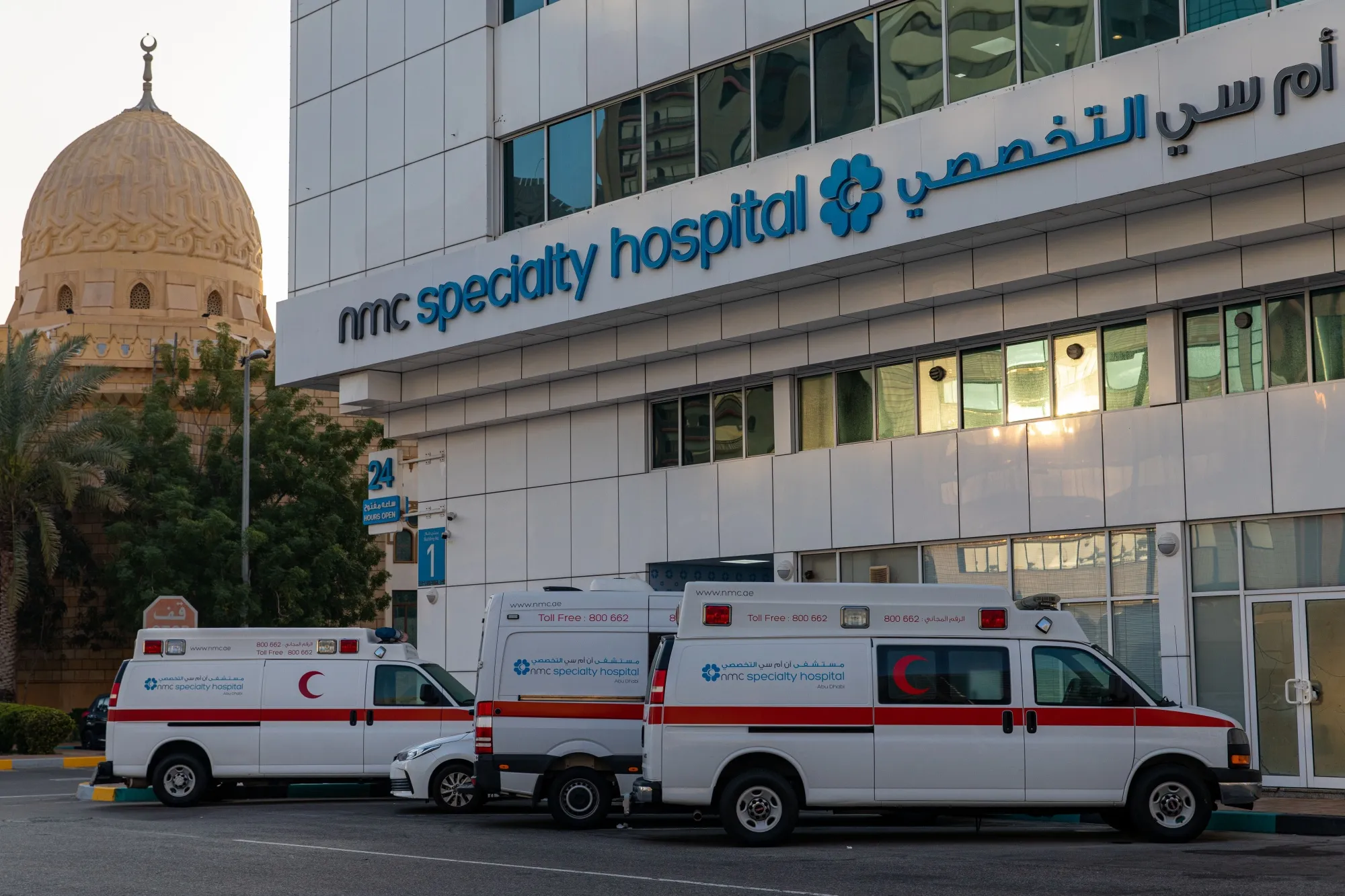 Ambulances sit outside the NMC Speciality Hospital, operated by NMC Health Plc, in Dubai.