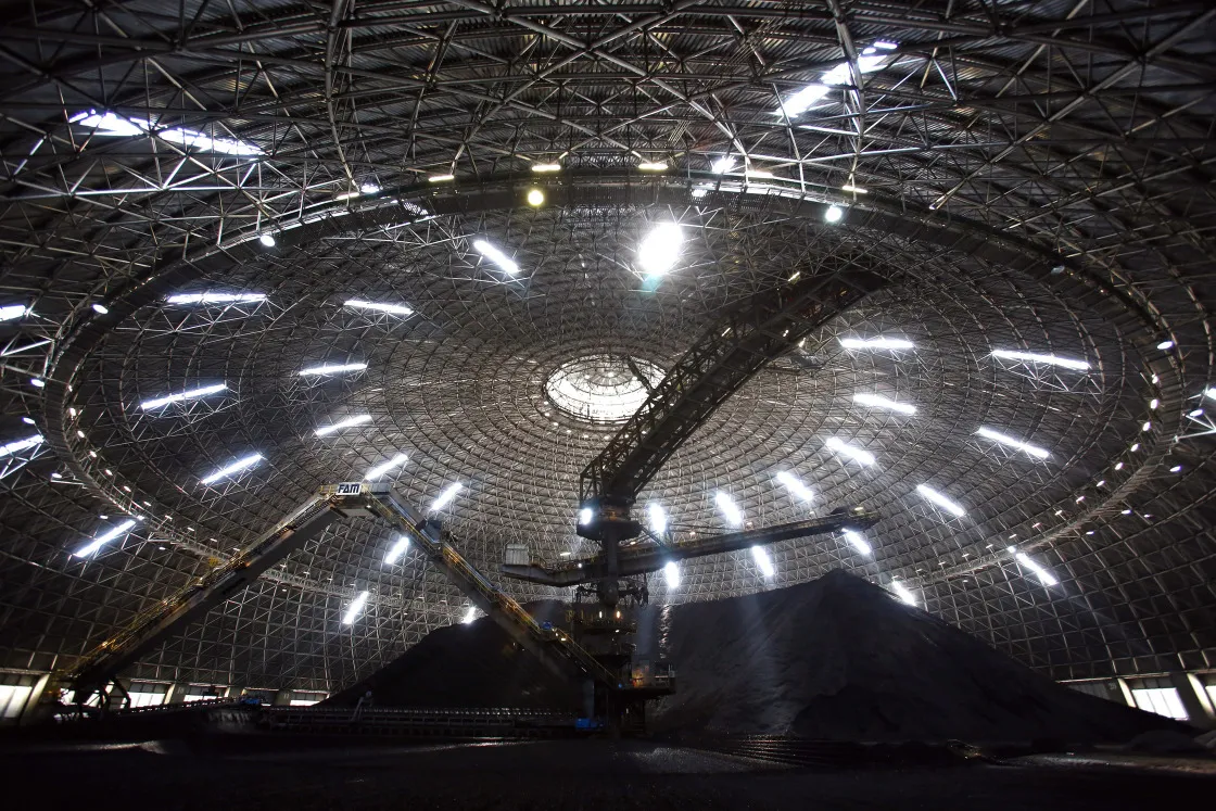 Coal sits inside the sealed storage dome at at Enel SpA's Torrevaldaliga Nord thermoelectric coal-fired power station in Civitavecchia, Italy.
