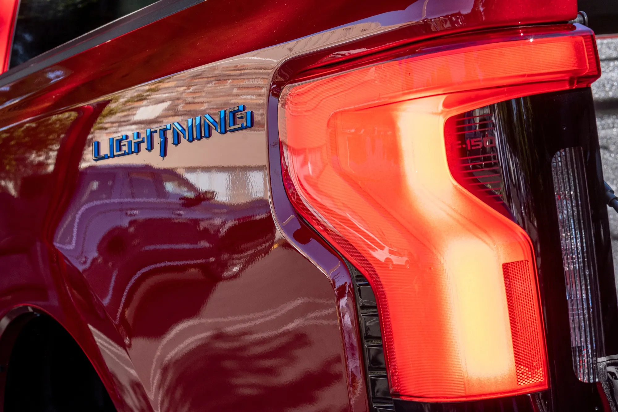 A tail light of a Ford F-150 Lightning pickup.