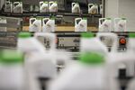 Bottles of Roundup weed killer move along conveyors on the production line at the herbicide manufacturing facility operated by Monsanto Co. in Antwerp, Belgium, on Tuesday, June 14, 2016.
