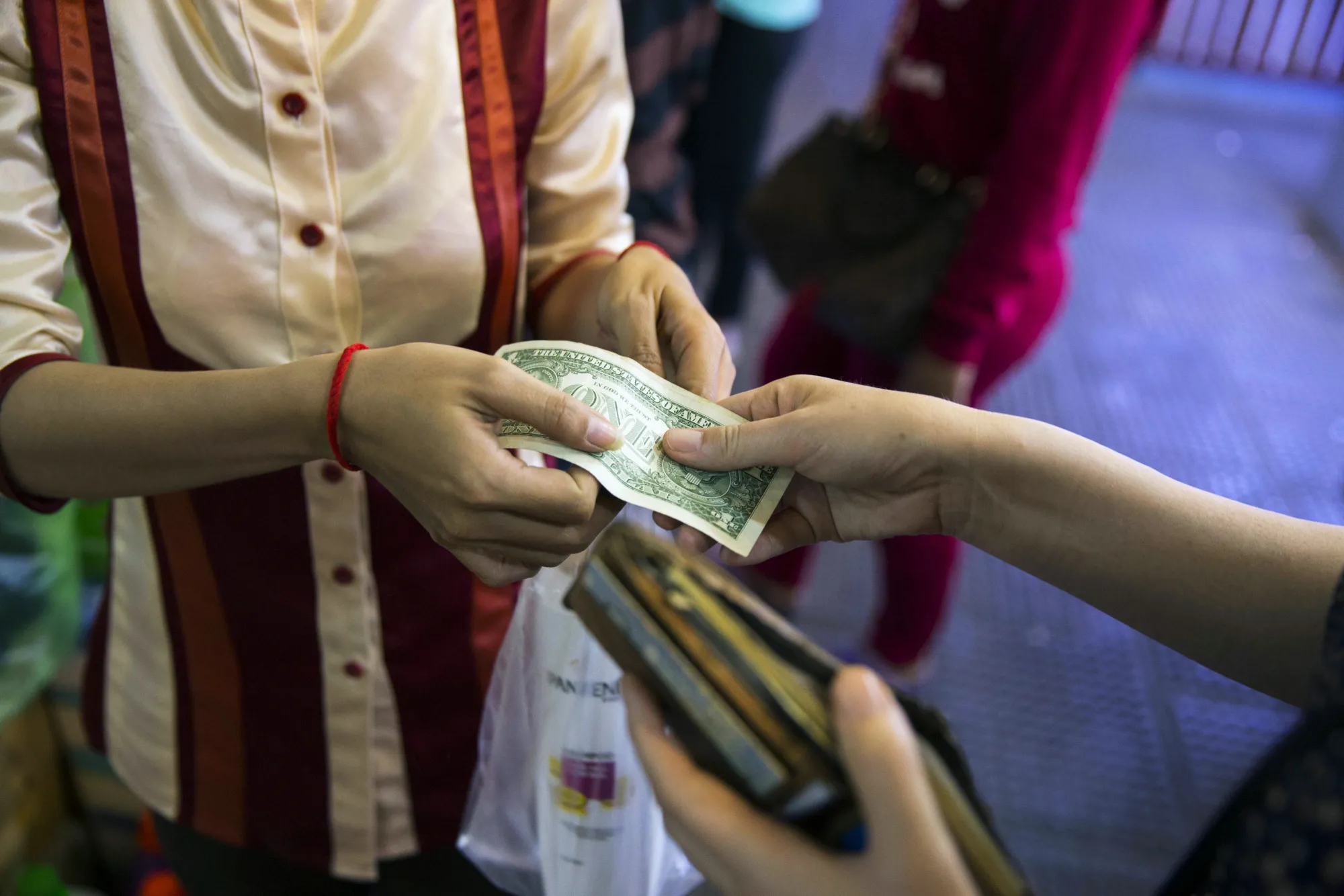 General Imagery Of The Economy And The Riel As Cambodia Promotes The Use Of Its Local Currency To Wean Off The Economy's Dependence On The Dollar