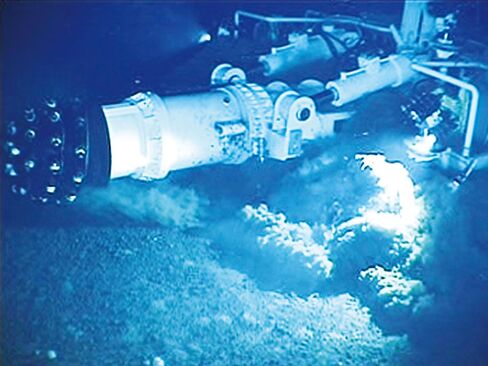 A mining equipment scours the seabed for minerals.