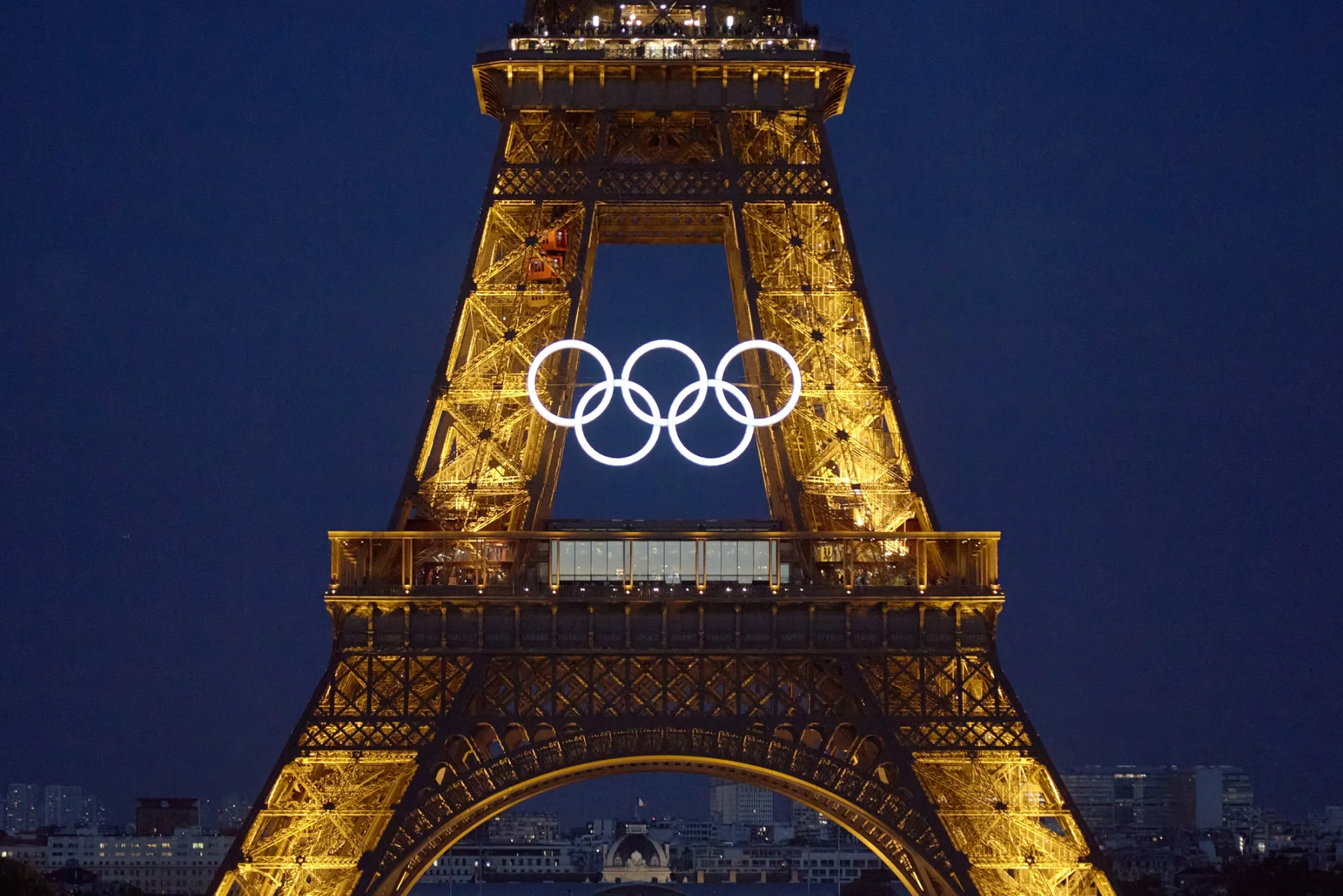 The Olympic Rings adorn the Eiffel Tower in Paris.
