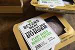 Packages of Beyond Meat plant-based burger patties.