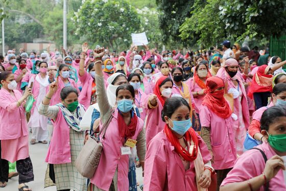 A Million Frontline Covid Workers Demand India Boost $40 Pay