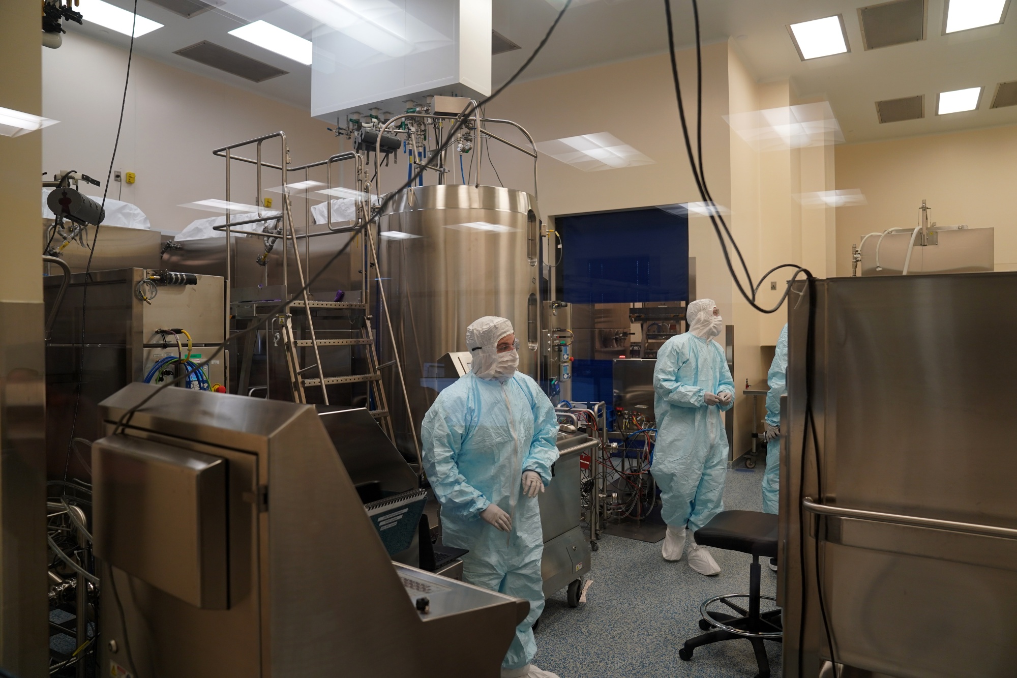 Workers inside a lab at Emergent Biosolutions in Baltimore on February 8.