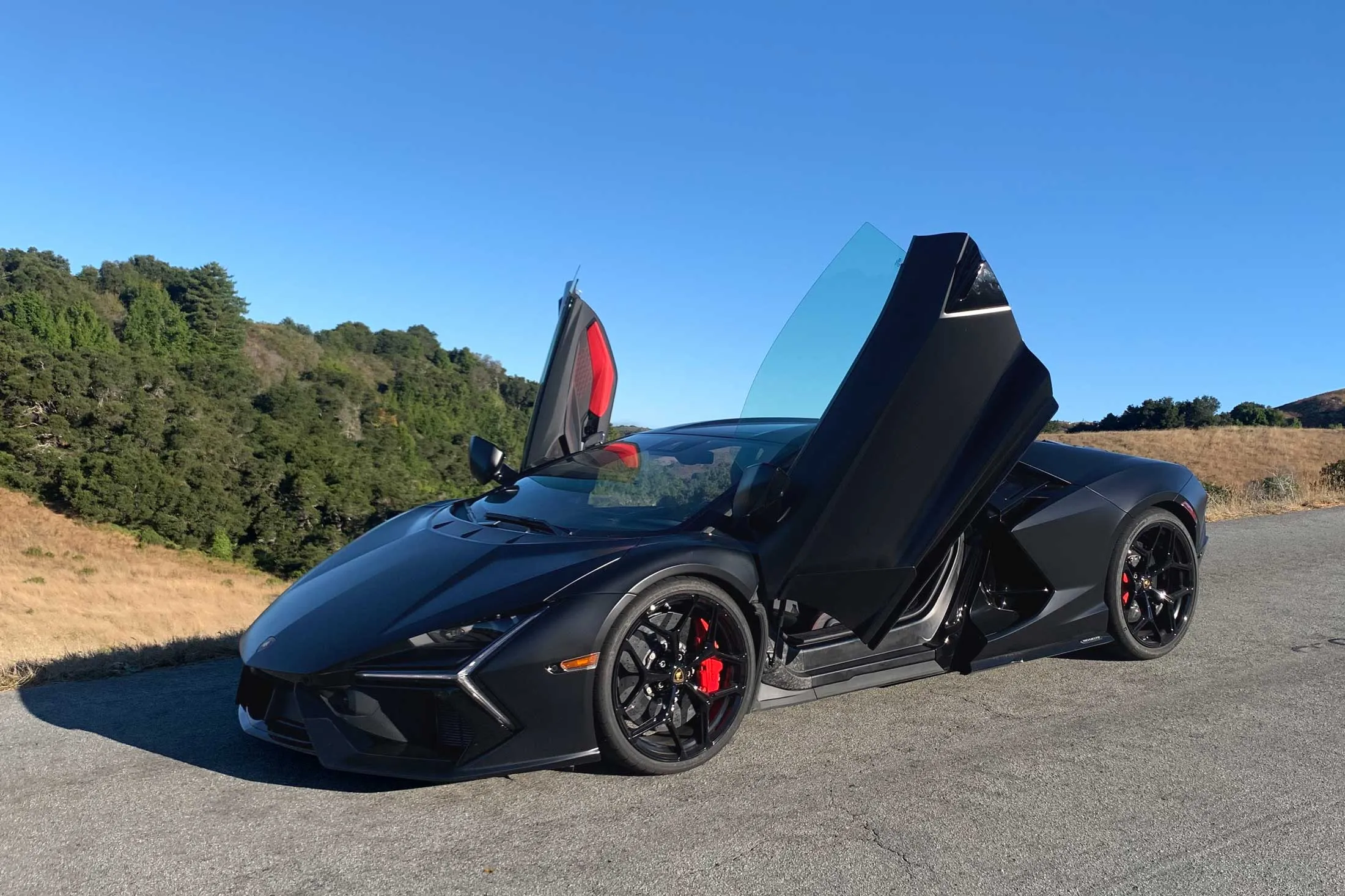 The Lamborghini Revuelto combines a V-12 engine with three electric motors for a grand sum of 1,001 horsepower.&nbsp;