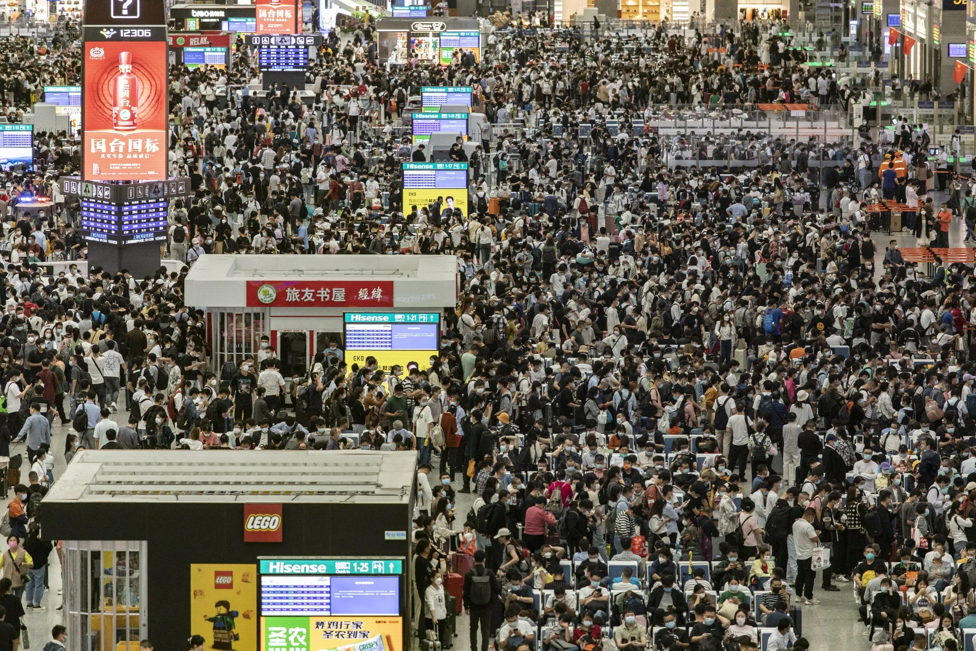 Travelers at Shanghai Hongqiao Railway Station ahead of the Golden Week holiday in Shanghai.