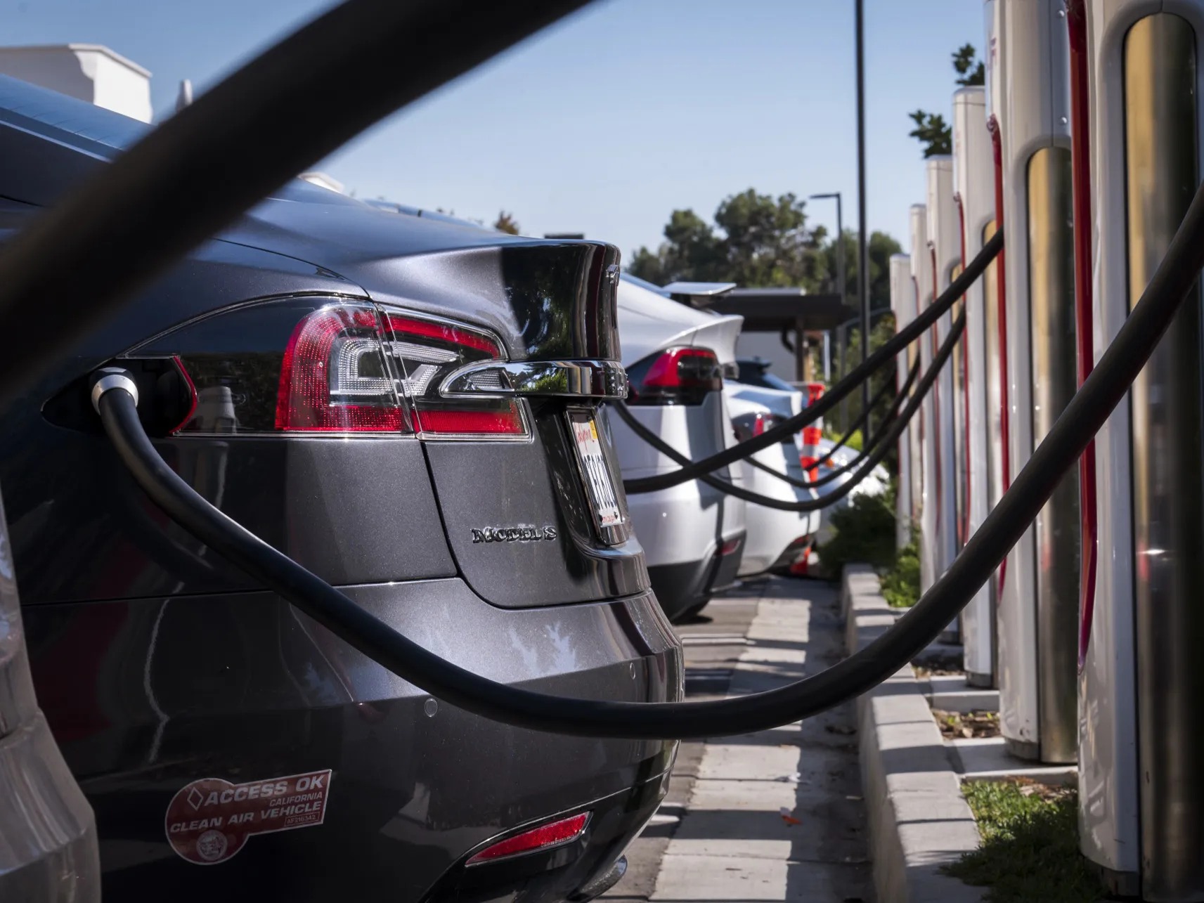 Tesla vehicles at a Supercharger station in Concord, California.
