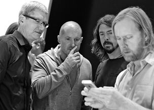 Cook, Ive, and Foo Fighter Dave Grohl at the iPhone 5 launch on Sept. 12