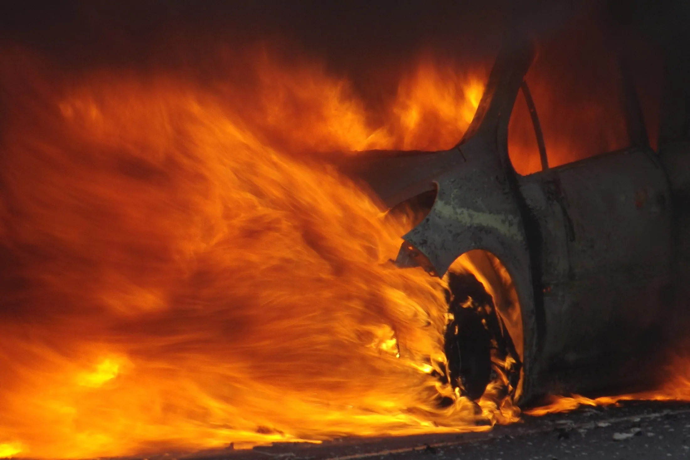 Panoramic View Of Burning Car