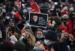 A supporter holds a placard depicting Alexey Navalny in Moscow.
