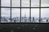 The Tokyo Tower, middle, and commercial and residential buildings are seen from the observatory in the Roppongi Hills Mori Tower, operated by Mori Building Co., in Tokyo, Japan, on Thursday, July 30, 2020. Officials in Japan are planning stricter measures on businesses and group activities as coronavirus cases continue to spread from a concentration around the capital to other urban areas across the country.