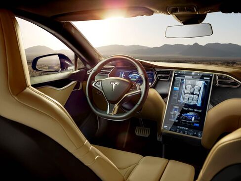 The interior of the P90D is focused around the 17-inch control screen in the center.