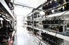 Circuit boards and computer equipment sit on shelves at a cryptocurrency mining facility in Incheon, South Korea.