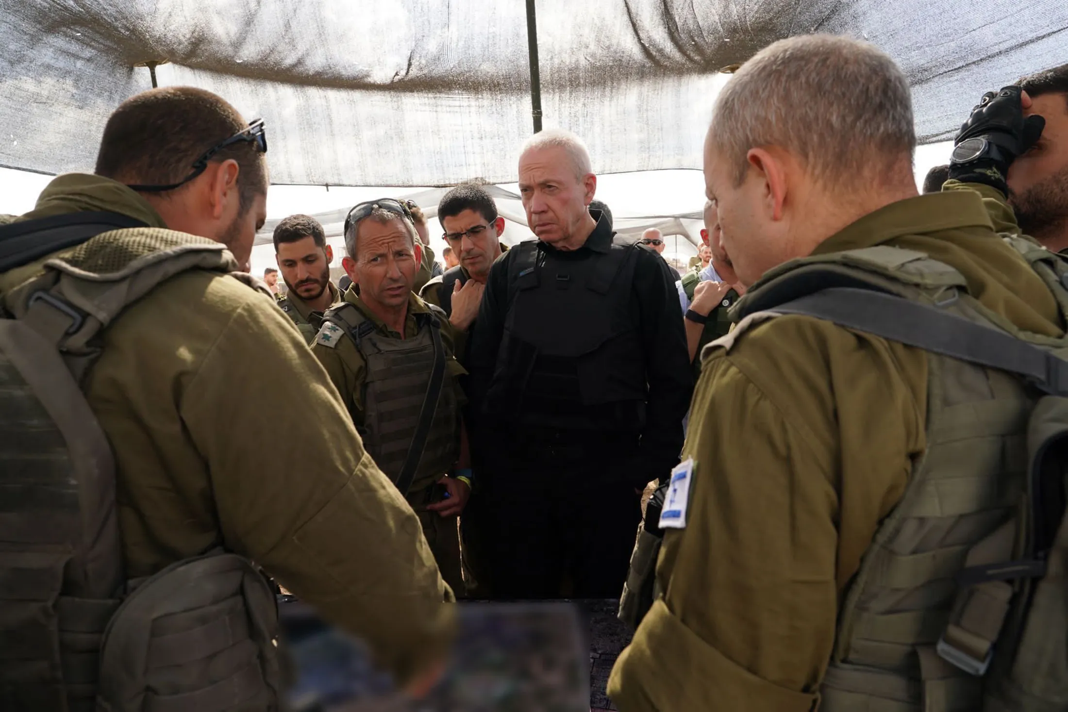 Israeli Defense Minister Yoav Gallant meets with Israeli soldiers near the Gaza border on Oct. 19.