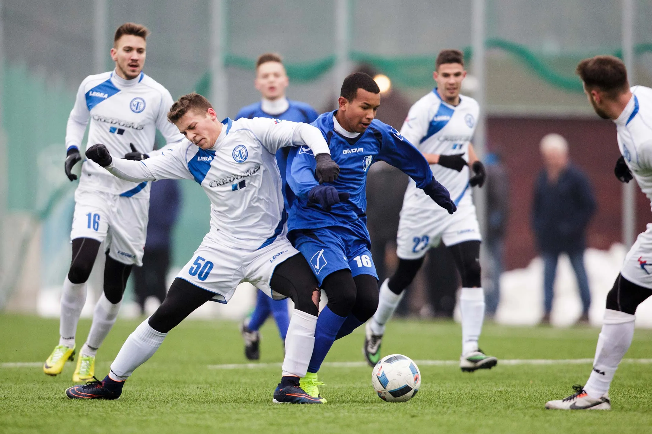 Willian Henrique dos Santos (&nbsp;No. 16, center-right) and other Brazilian players of Slovakian football club FC STK Samorin in action against players with&nbsp;Hungarian football club MTE Mosonmagyarovar, during a friendly soccer match.
