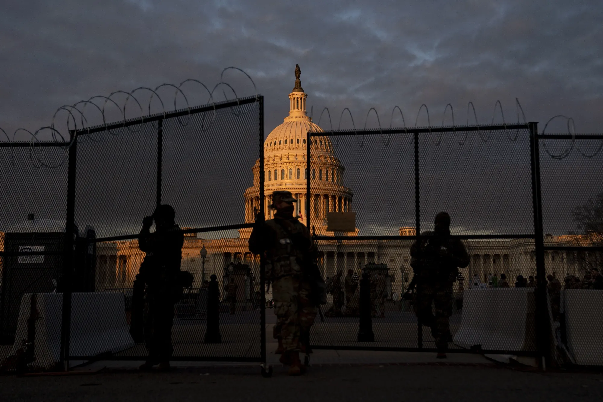 Biden Arrival In Washington Framed By Division And Heavy Security