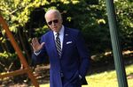 Joe Biden waves while walking on the South Lawn of the White House before boarding Marine One in Washington, D.C., on July 20.