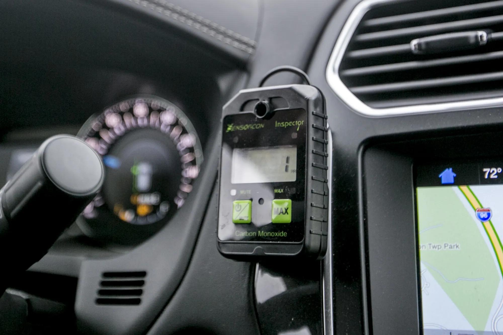 A carbon monoxide detector&nbsp;on the dashboard of a&nbsp;SUV&nbsp;in 2019.