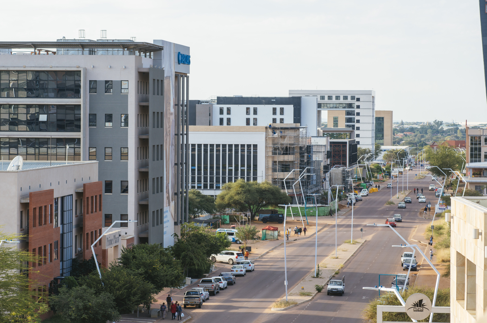 Commercial buildings, including the Barclays Bank of Botswana Ltd. office, second right, stand in the central business district of Gaborone, Botswana.