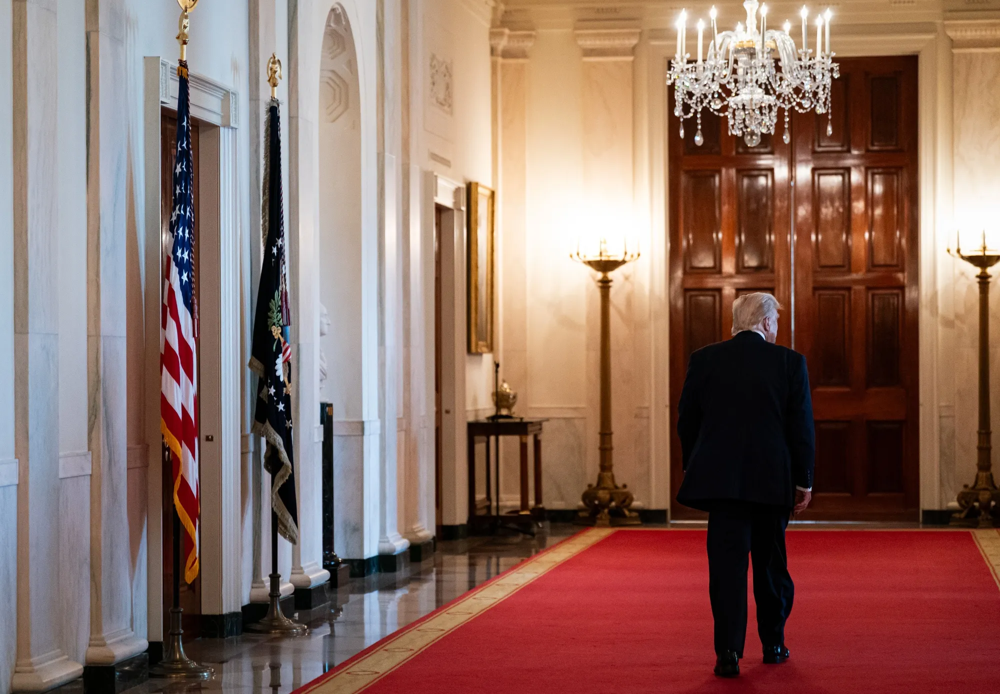 US President Donald Trump departs following a signing ceremony&nbsp;in the East Room of the White House in Washington, DC, on&nbsp;July 18.