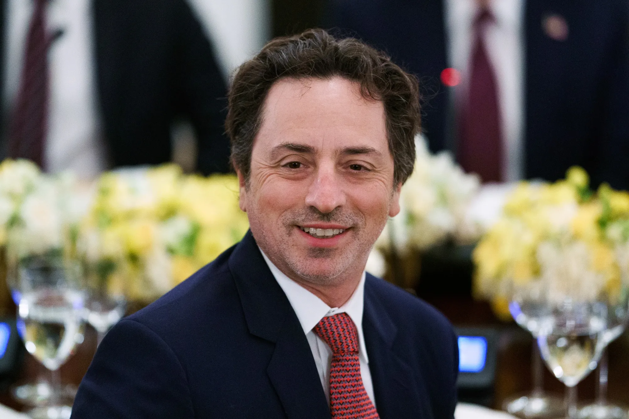 Sergey Brin, president of Alphabet and co-founder of Google Inc., during a dinner with tech leaders in the State Dining Room of the White House in Washington, DC, US, on Thursday, Sept. 4, 2025. US President Donald Trump said he would be imposing tariffs on semiconductor imports “very shortly” but spare goods from companies like Apple Inc. that have pledged to boost their US investments.