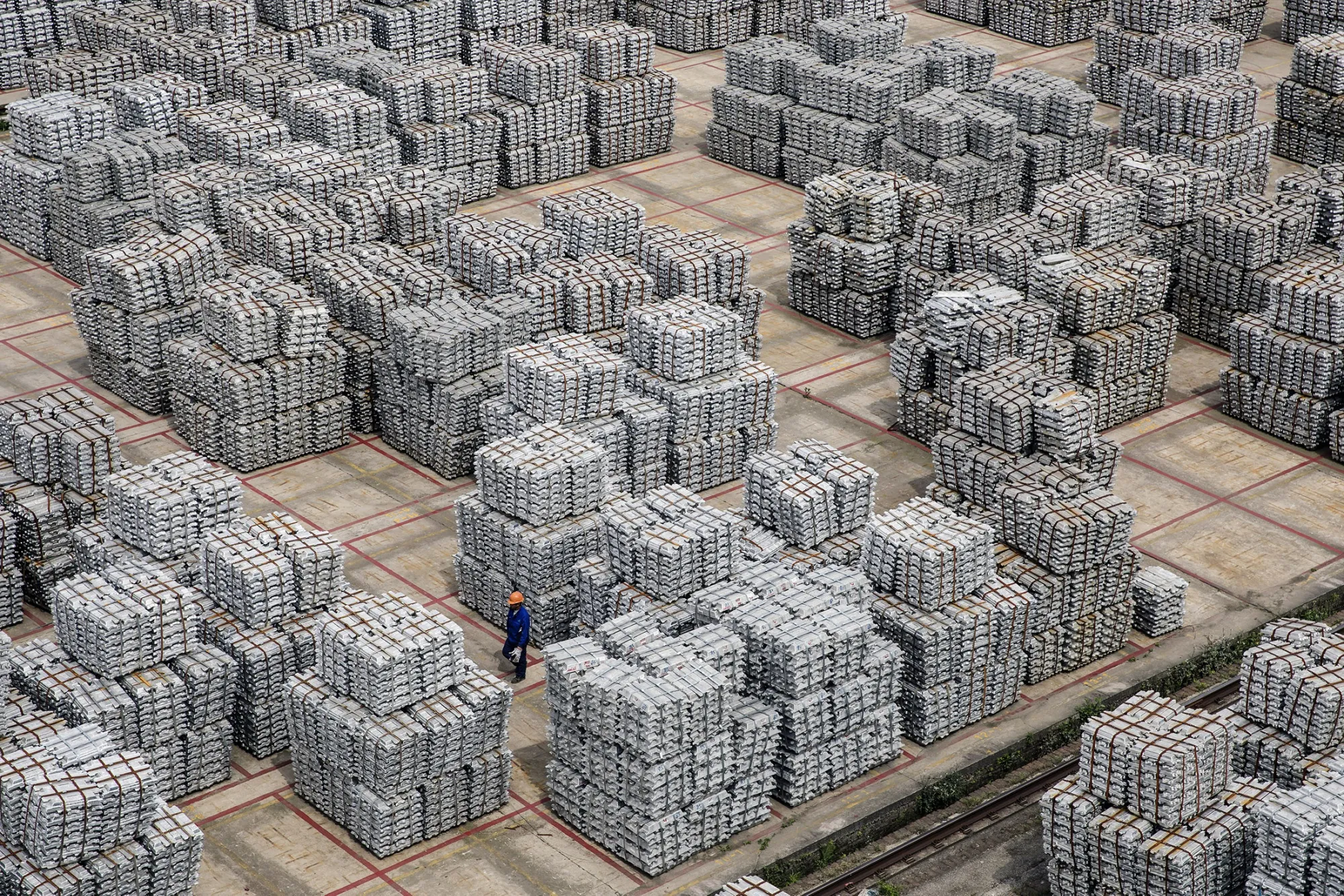 Aluminum Stockpiles at a Depot as China's Trade Shows Economic Recovery Tested by Global Slowdown