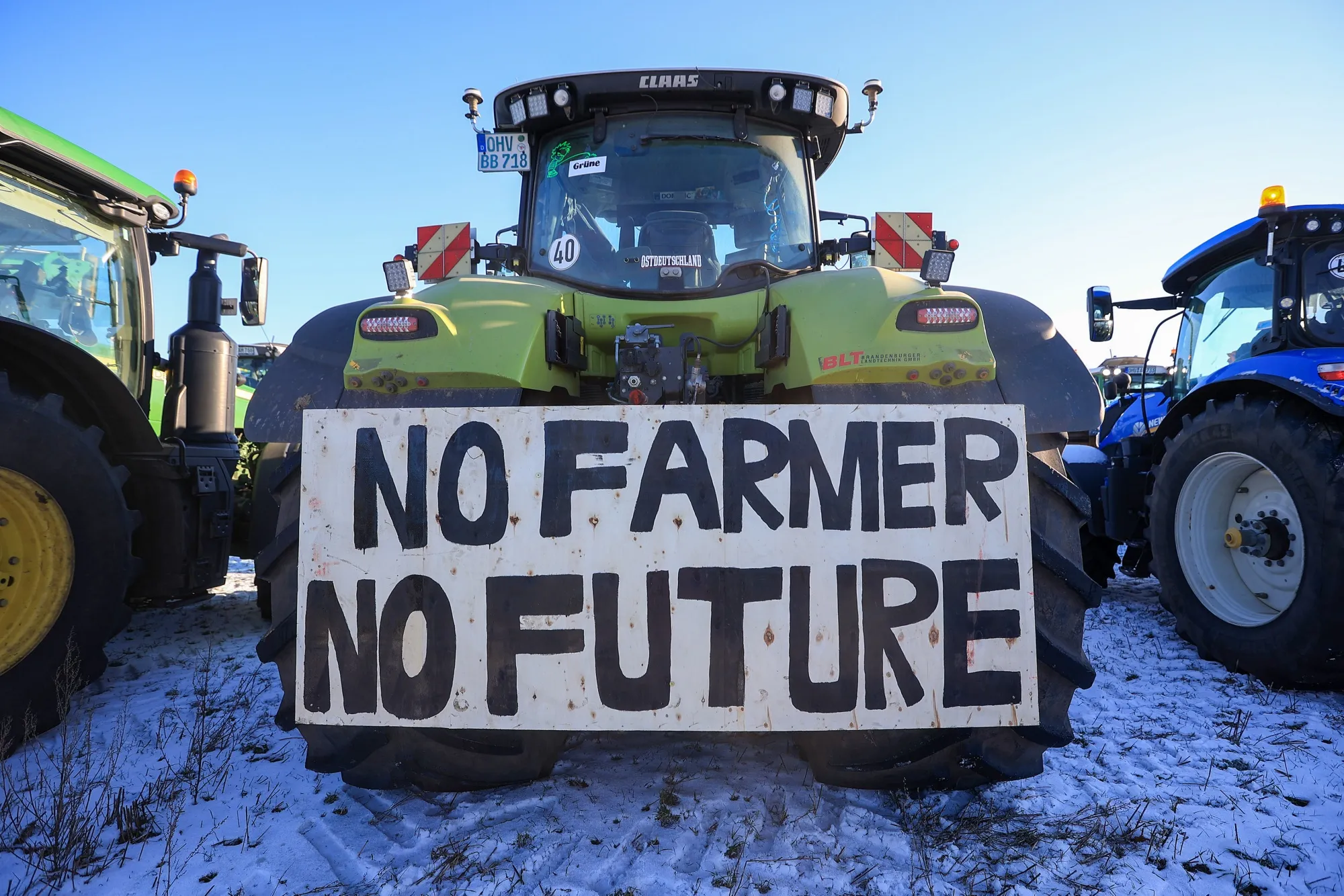 A banner on a tractor reading "No Farmer, No Future", during a farmers protest against the German government's planned cuts to agricultural sector subsides, at Meseberg Castle in Brandenburg, Germany, on Wednesday, Jan. 10, 2024.&nbsp;