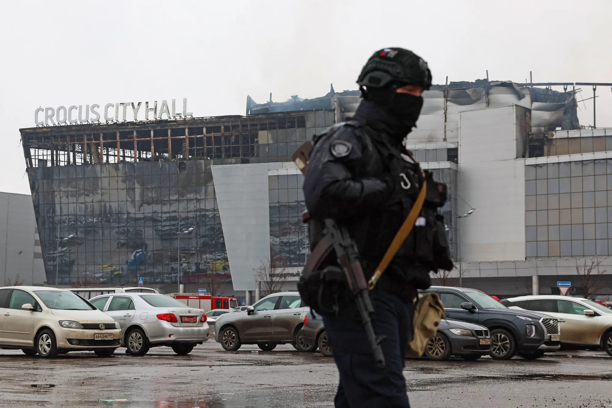 A law enforcement officer patrols the scene of the gun attack at the Crocus City Hall concert hall in Krasnogorsk, outside Moscow, on March 23, 2024.