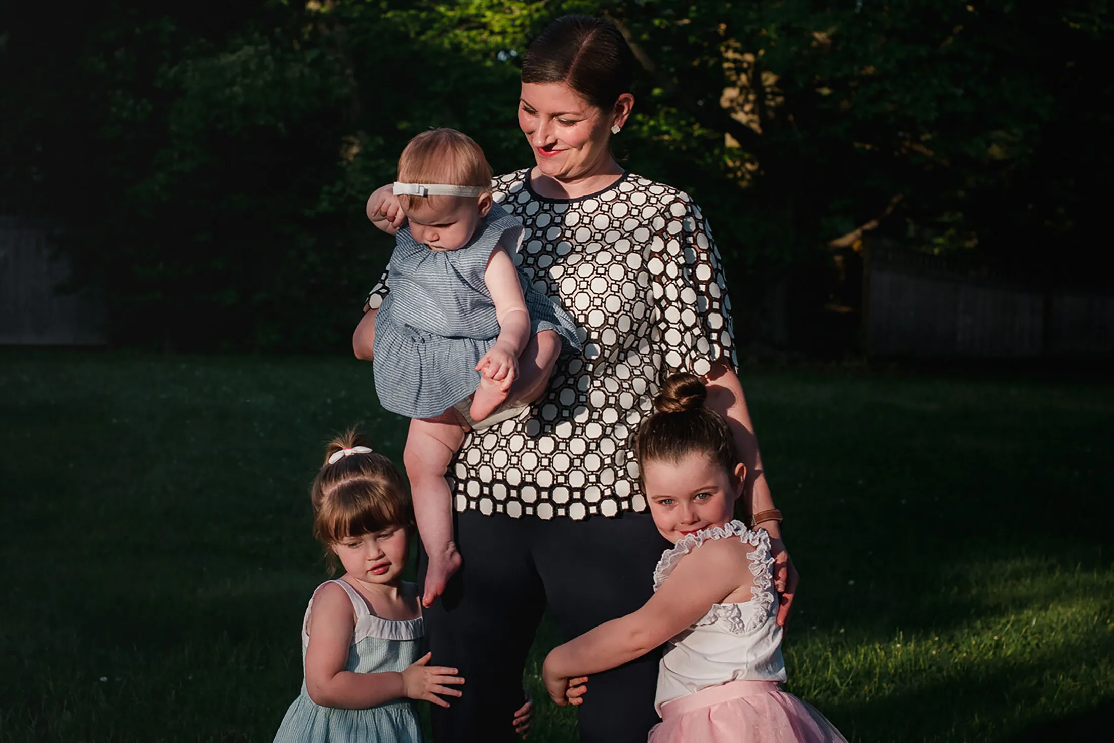 Ashley Reckdenwald with her daughters Drew, Sydney, and Stella.