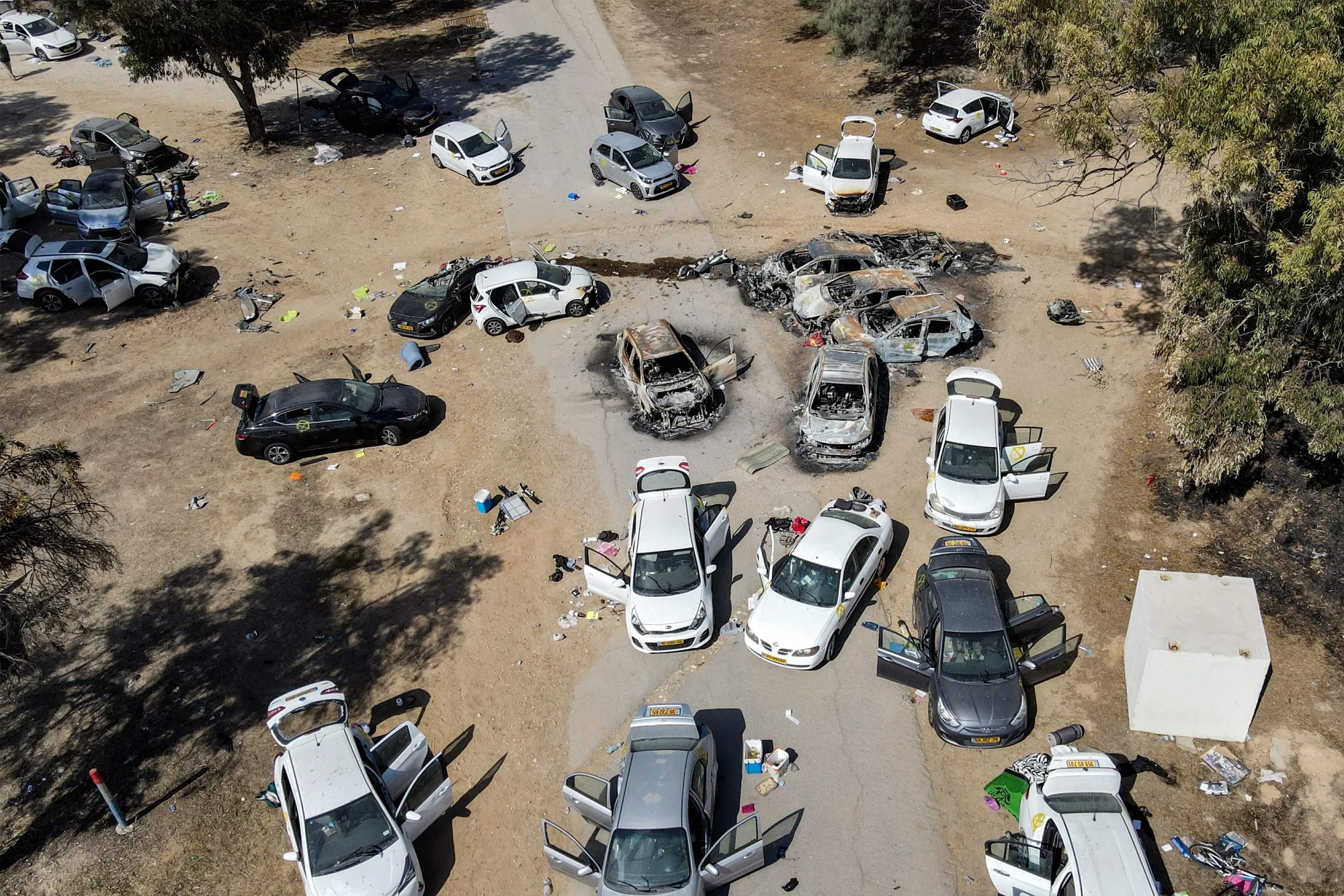 Abandoned and torched vehicles at the site of the October 7 attack on the Supernova music Festival in the Negev desert in southern Israel in 2023.&nbsp;