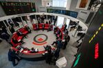 Traders, brokers and clerks on the trading floor of the open outcry pit at the London Metal Exchange in London, U.K.