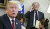 John Bolton listens as Donald Trump speaks in the Oval Office of the White House in Washington, D.C., on May 22, 2018.