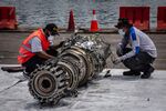 Investigators inspect the wreckage from flight JT610 in Jakarta on Nov. 4.