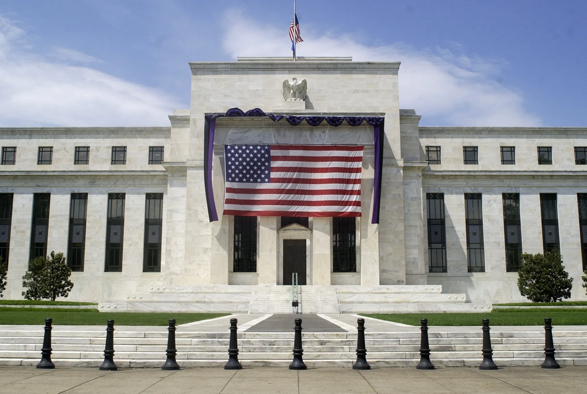 The Marriner S. Eccles Federal Reserve Board Building is seen in Washington, DC June 10, 2004. The Federal Reserve will at least double its 1 percent interest- rate target for overnight loans between banks by year-end, a majority of economists at Wall Street's largest bond-trading firms said.
