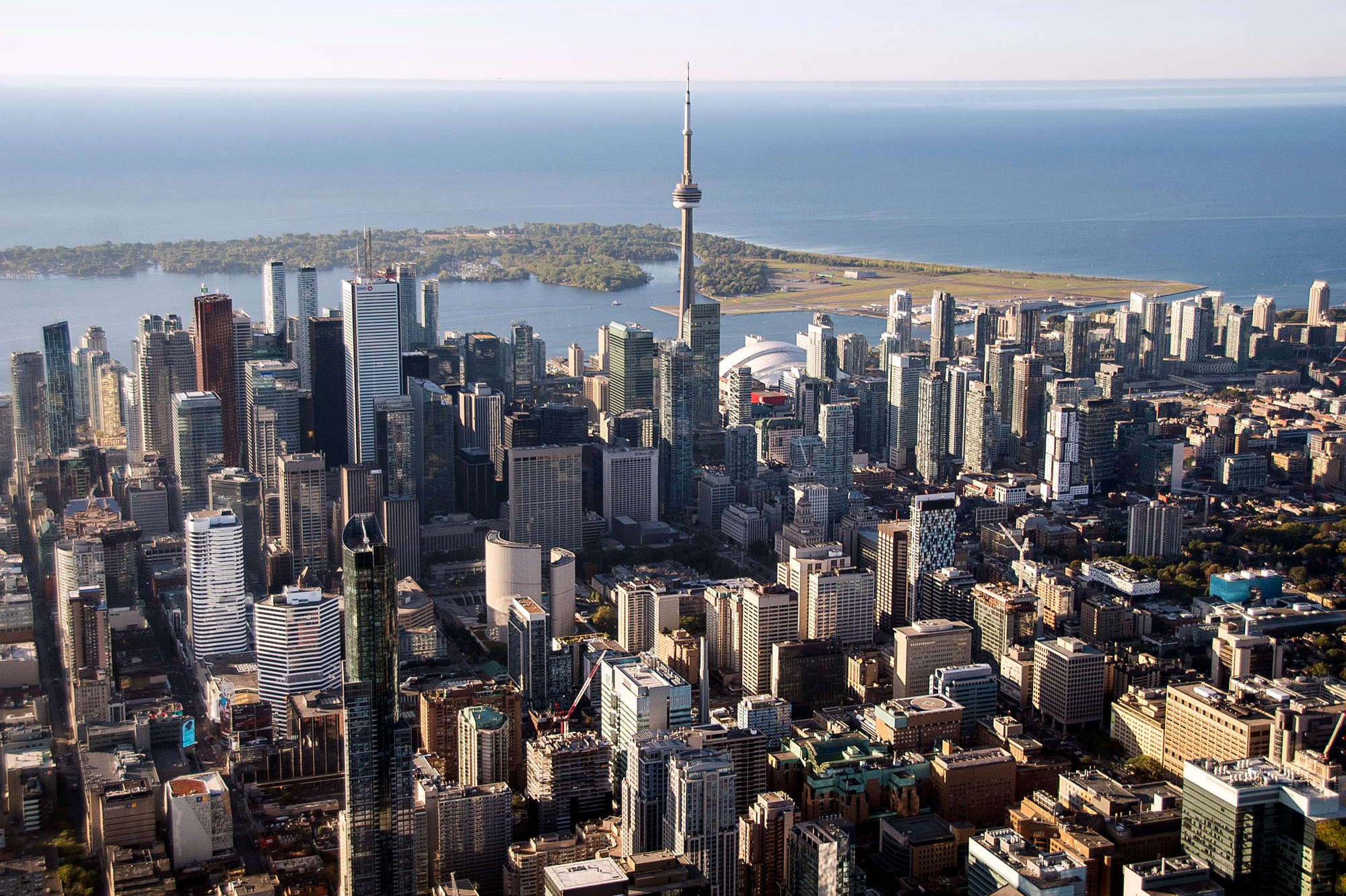 The CN Tower stands among buildings in the downtown skyline in this aerial photograph taken above Toronto, Ontario, Canada, on Monday, Oct. 2, 2017.