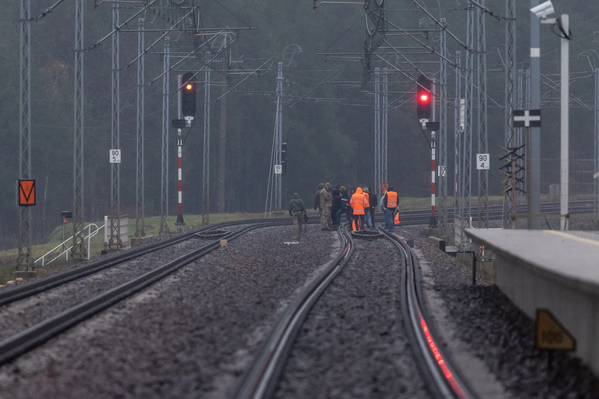 Investigators examine&nbsp;the damaged railway&nbsp;following an explosion on the rail line in Mika, Poland, on Nov. 17.
