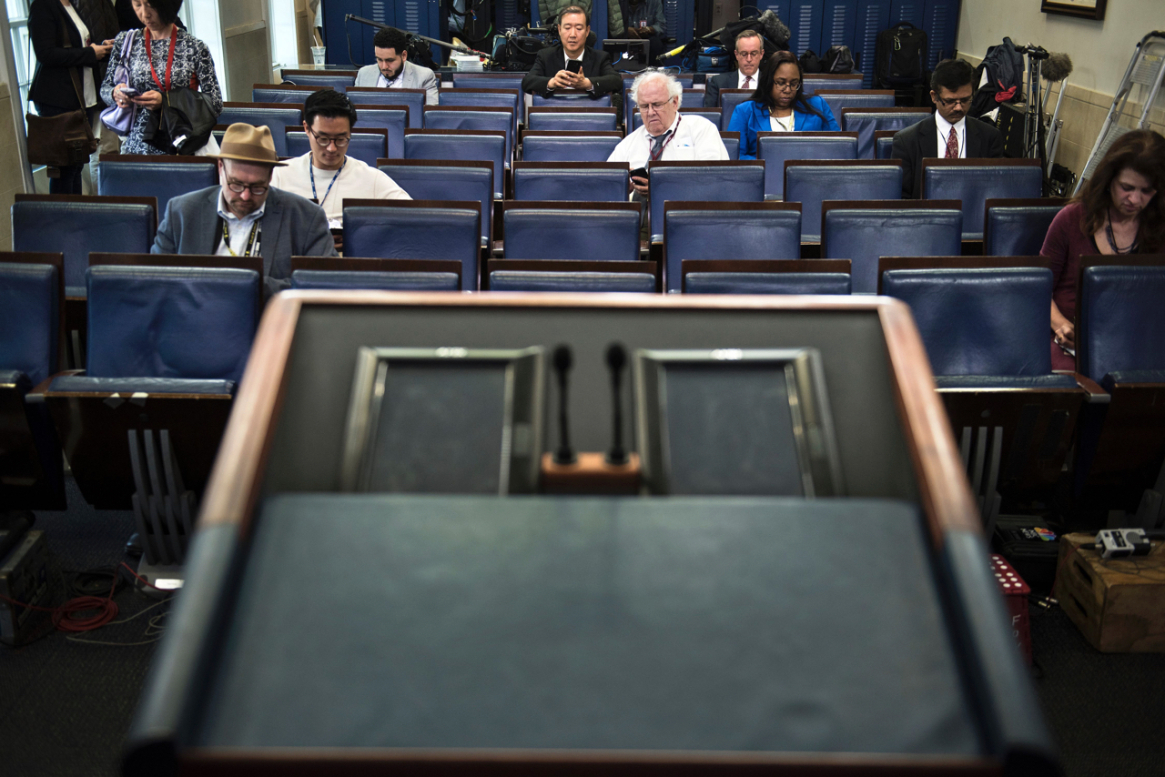 An empty podium is seen as an off-camera briefing is held with a small group of reporters and White House press secretary Sean Spicer instead of the normal on-camera briefing at the White House on Feb. 24, 2017, in Washington.

