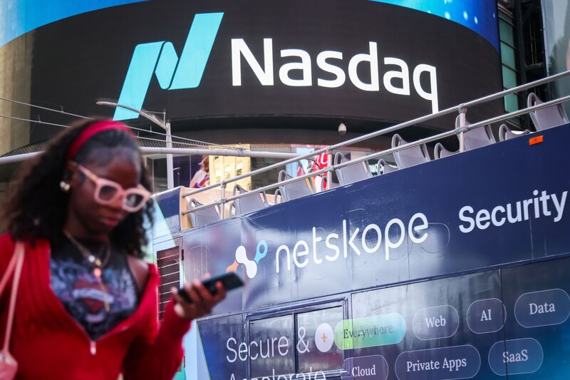 Netskope Inc. signage during the company's initial public offering (IPO) at the Nasdaq MarketSite in New York, US, on Thursday, Sept. 18, 2025. Netskope Inc.’s shares jumped 21% in its trading debut, after the cybersecurity firm raised $908.2 million in an initial public offering.