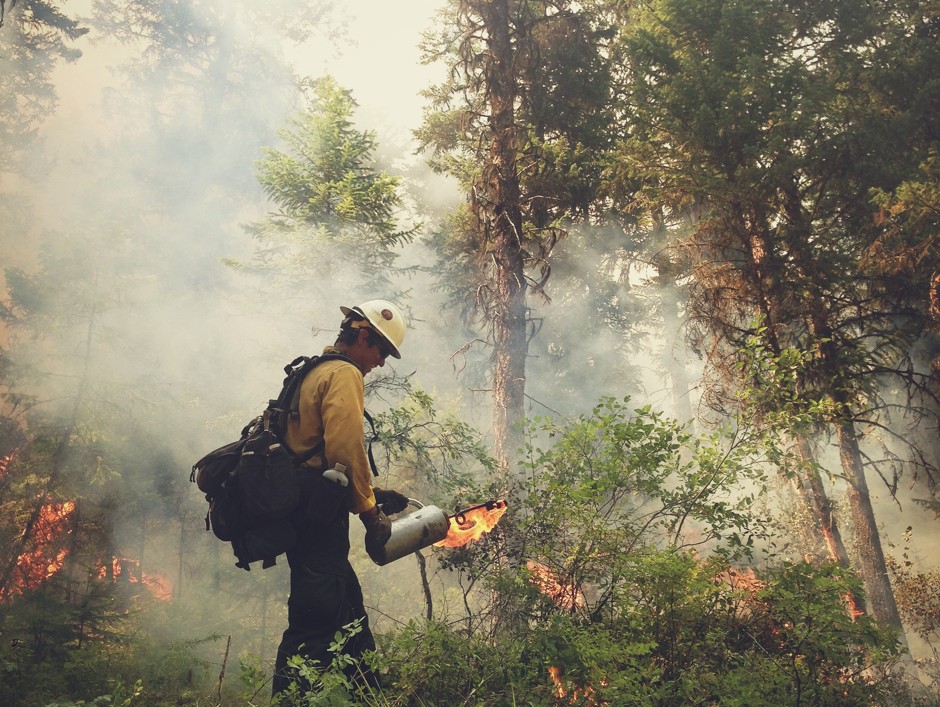A fellow Hotshot fights fire with fire in Lolo National Forest, 2013.